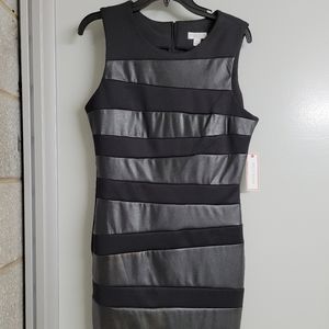 Black dress with faux leather inserts, size 10. NWT